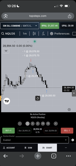 Topstep 50K combine on day one: the trade with entries and exits, realized P&L $1,557.44